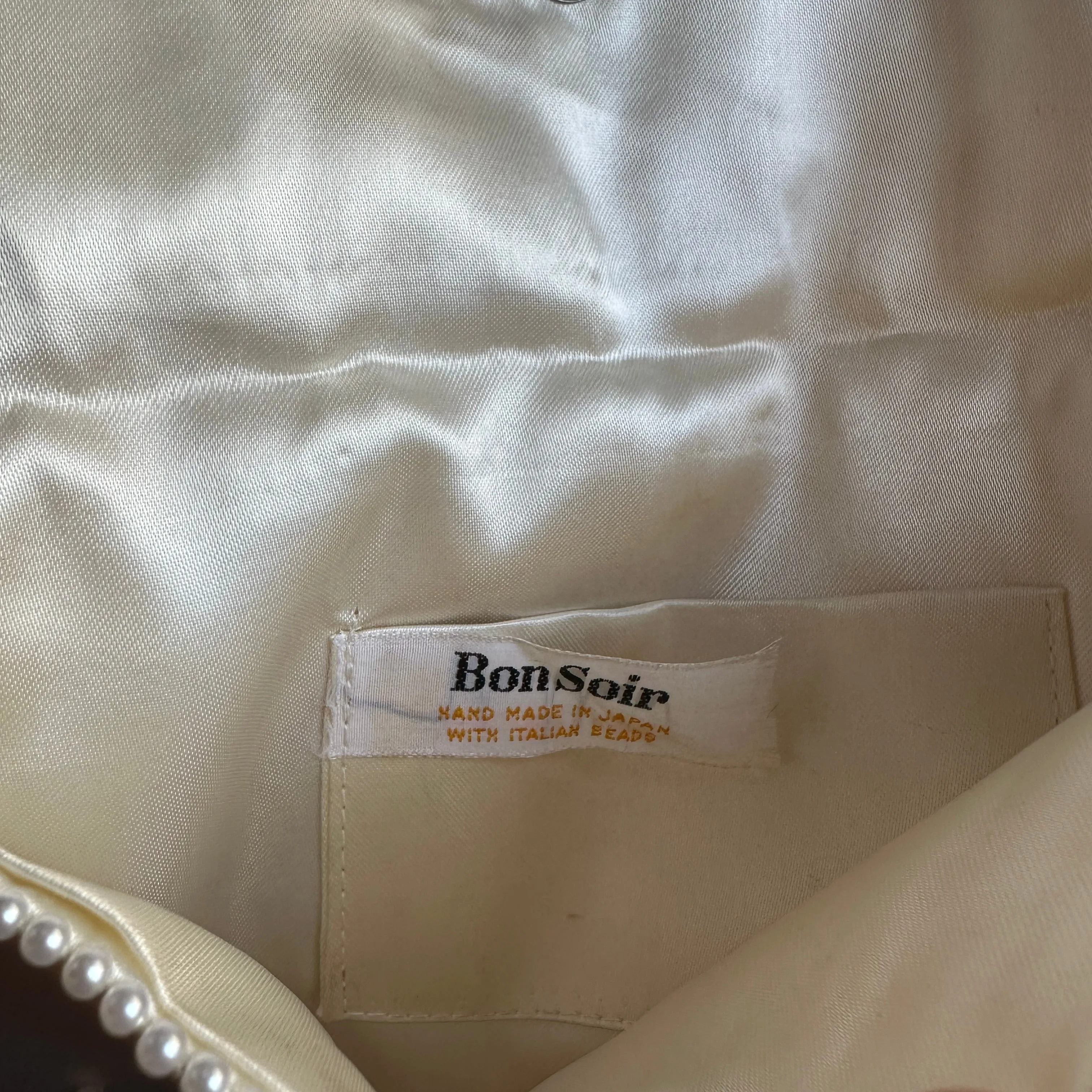 “Bon Soir” White beaded silk clutch